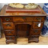 An 18th century and later walnut kneehole desk, width 78cm depth 50cm height 76cm