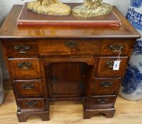 An 18th century and later walnut kneehole desk, width 78cm depth 50cm height 76cm