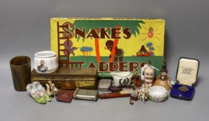 A group of collectables including a Boer War horn cup, a 1930's Betty Boop ceramic scent bottle, a