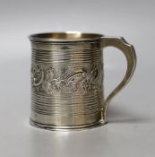 A William IV silver christening mug, with reeded and embossed decoration, London, 1834, 63mm, 98