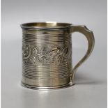 A William IV silver christening mug, with reeded and embossed decoration, London, 1834, 63mm, 98