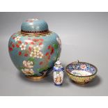 A Canton enamel tea bowl, snuff bottle, and a cloisonne enamel jar and cover