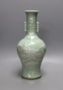 A Chinese slip decorated celadon ground arrow vase 28cm