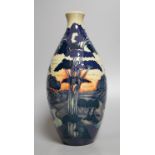 A Moorcroft 'trees in a dusky landscape' trial vase, boxed,23.5 cms high.