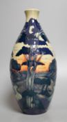 A Moorcroft 'trees in a dusky landscape' trial vase, boxed,23.5 cms high.