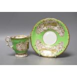 Copeland and Garrett fine topographical pedestal coffee cup and saucer with green ground painted