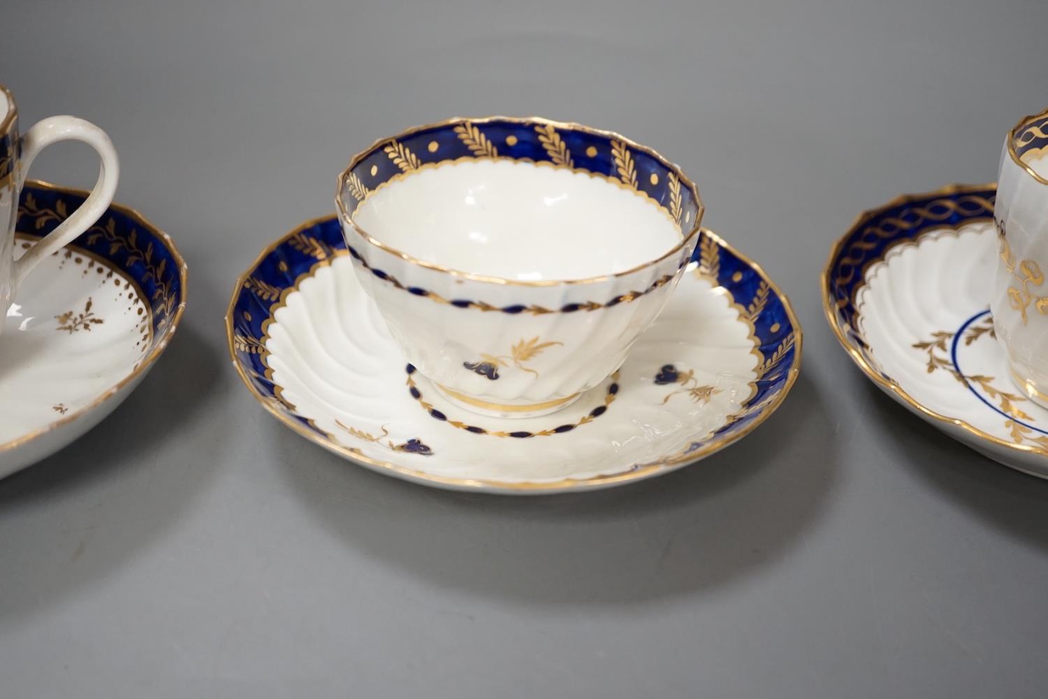 Three flight Worcester shankered teawares two coffee cup and saucers with blue borders and a teabowl - Image 3 of 14