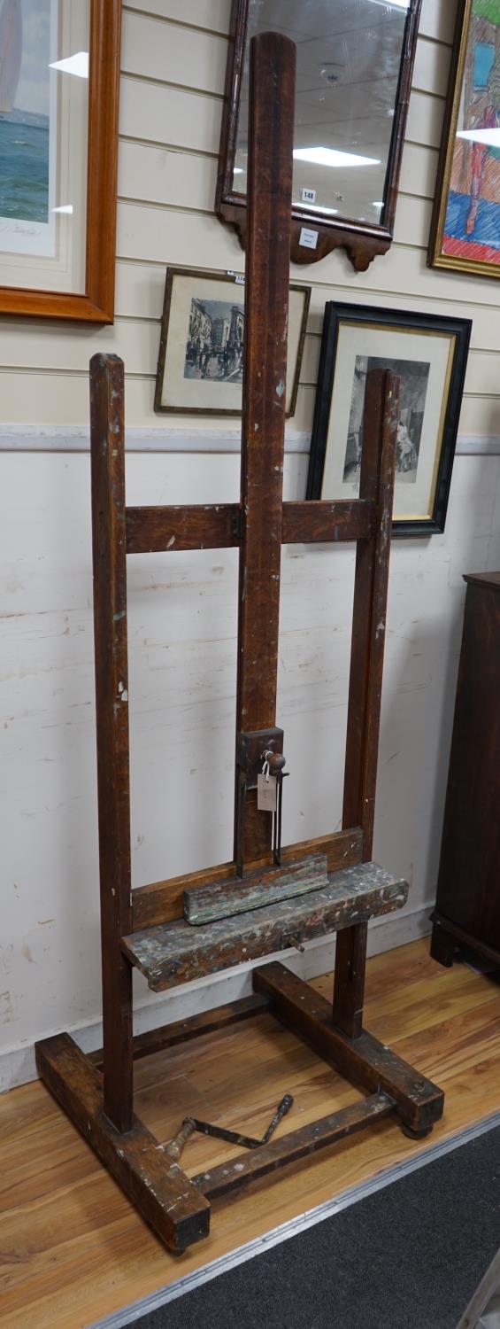 A Victorian oak adjustable artist's studio easel, by Reeves & Son, height 67cm