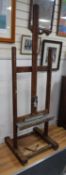 A Victorian oak adjustable artist's studio easel, by Reeves & Son, height 67cm