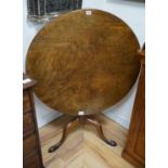 A George III circular mahogany tilt top tripod tea table, diameter 82cm height 68cm