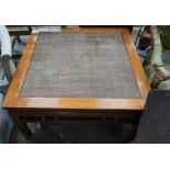 A Chinese caned pine and hardwood square low table, width 97cm height 51cm