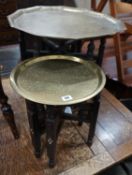 Two Indian brass tray top folding tables, largest width 56cm height 49cm