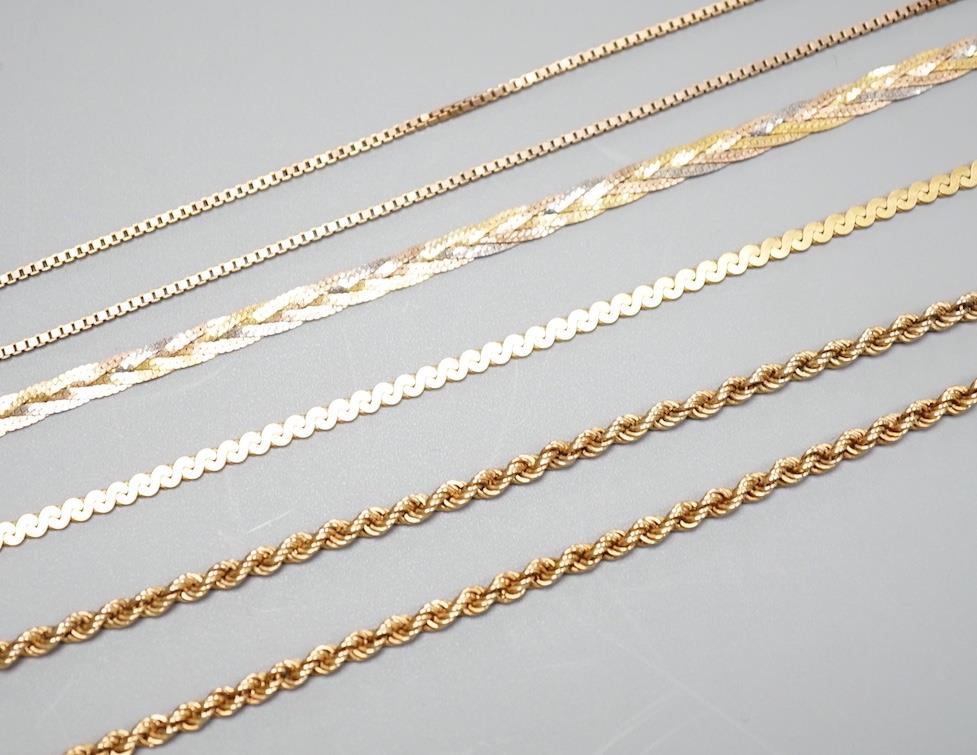 Four assorted modern 9ct chains, including three colour and rope twist, largest 38cm, 25.1 grams.