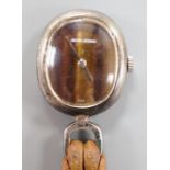 A white metal pendant watch with tiger's eye quartz dial inscribed 'Georg Jensen' overall 37mm, on a