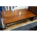 A modern rectanguar walnut and wrought iron coffee table, width 122cm depth 61cm height 41cm