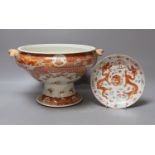 A Japanese red and white pedestal bowl, 19cm high, and a dragon pattern dish (2)