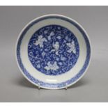 A Chinese blue and white saucer dish, Kangxi mark but later, 16cm diameter