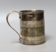 A George III silver mug, with two reeded bands and engraved inscription to the base, no maker's