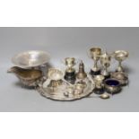 A George V silver salver, a silver tazze, a silver sauceboat, three silver condiments, a silver