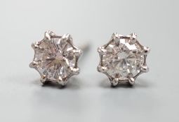 A pair of 750 white metal and solitaire diamond set ear studs,each stone weighing approx. 0.45ct,