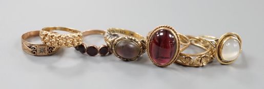 Seven assorted Victorian and later 9ct gold or 9ct gold and gem set dress rings, including