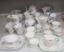Large quantity of Shelley tea wares to include Syringo 12025, Wild Flowers 2823, Hydrangea 12318, WR