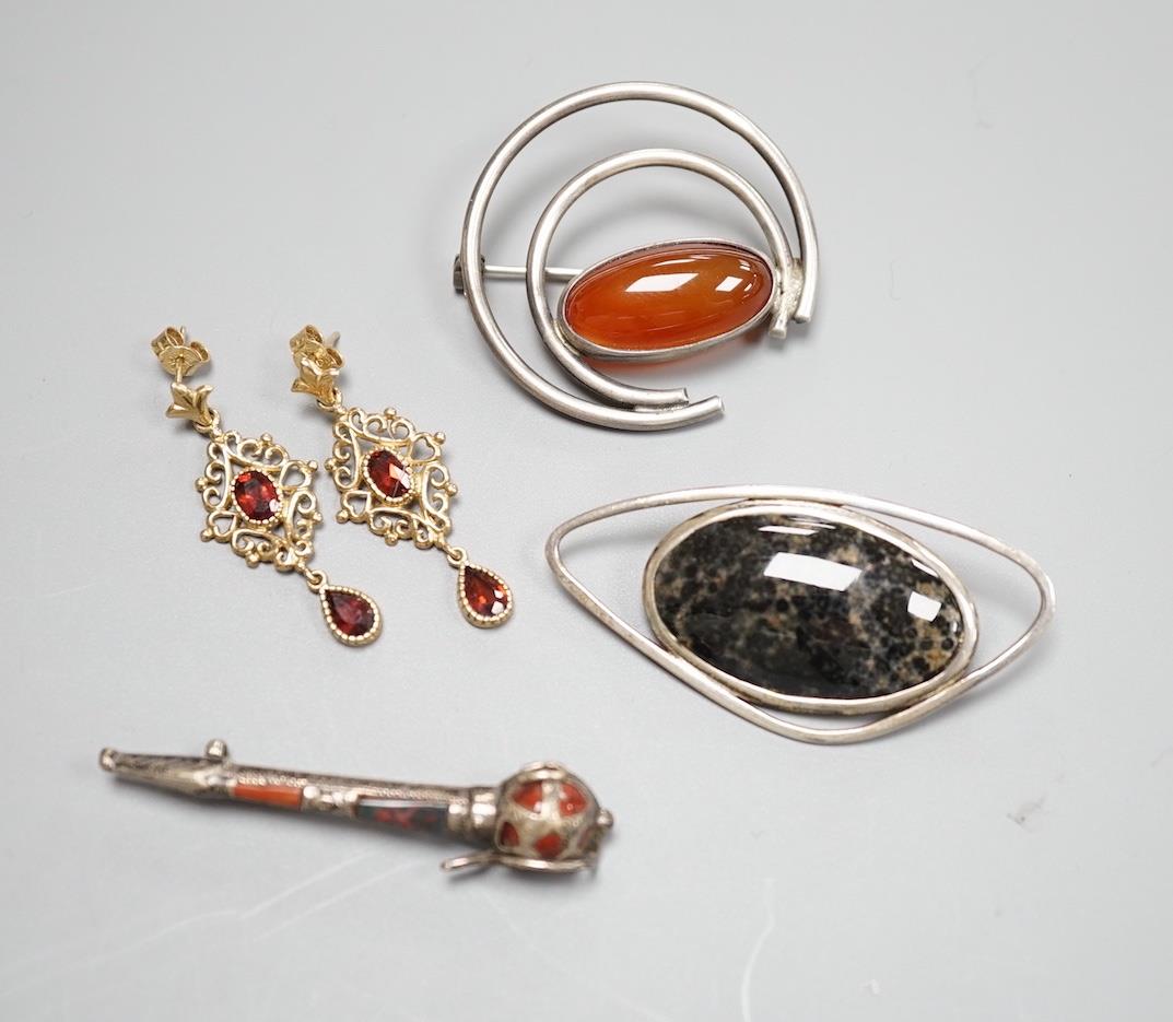 A modern pair of 9ct and gem set drop earrings and three white metal gem set brooches, including one