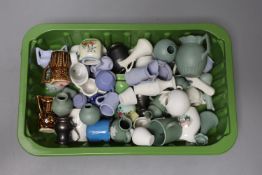 A quantity of miniature jugs