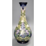 A Moorcroft 'wolfsbane' vase by Anji Davenport, 8.11.01, 99/350,30 cms high.