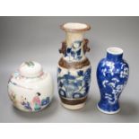 A 19th century Chinese blue and white prunus jar, a crackle glaze vase and a famille rose jar and