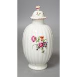 A Worcester tea canister and rare cover painted with flowers on a fluted body c.1770. 16.5cm