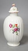 A Worcester tea canister and rare cover painted with flowers on a fluted body c.1770. 16.5cm