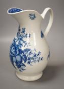 A Worcester French style water ewer decorated in under-glaze blue with fir cones and rose hips c.