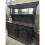 A late 19th century Flemish carved oak mirror back sideboard, width 150cm depth 56cm height 188cm