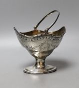 A George III silver oval sugar basket, maker C.S, London, 1787, width 12.1cm, 156 grams.