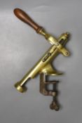 A Chambers patent bar mounting brass clamp corkscrew marked ‘THE DON’ with turned beech handle
