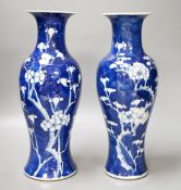 Two 19th century Chinese blue and white prunus vases, 31cm