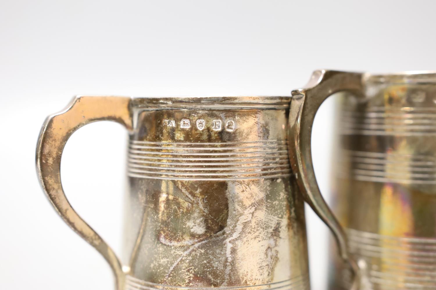 Three small Georgian silver mugs, two with two reeded bands, Stephen Adams I, London, 1801, 64mm and - Image 3 of 3