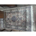 A North West Persian style ivory ground rug, 190 x 122cm