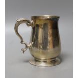 A late George II silver baluster mug, Ebenezer Coker, London, 1759, 10.5cm, 226 grams.