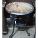 A cast iron Britannia circular table, diameter 58cm height 70cm