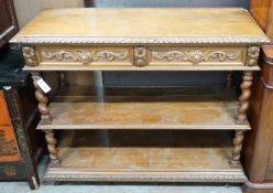 A late Victorian carved oak three tier buffet, width 115cm depth 44cm height 98cm