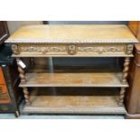 A late Victorian carved oak three tier buffet, width 115cm depth 44cm height 98cm