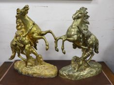 A pair of bronze Marly horses after Cousteau