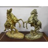 A pair of bronze Marly horses after Cousteau