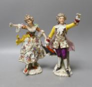 A pair of Naples porcelain figures - tallest 23cm
