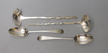 A pair of George III Scottish silver sauce ladles, with spiral handles, Alexander Spence, Edinburgh,
