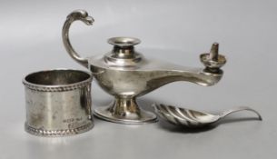 A George V silver 'Aladdin's Lamp' lighter (lacking cover), length 12cm, a silver napkin ring and