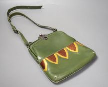 An unusual Art Deco green, brown and yellow leather handbag,24 cms high ( including clasp) x 20