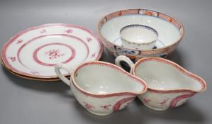 A group of 18th century chinese export: two plates, two sauceboats, a bowl and a tea bowl